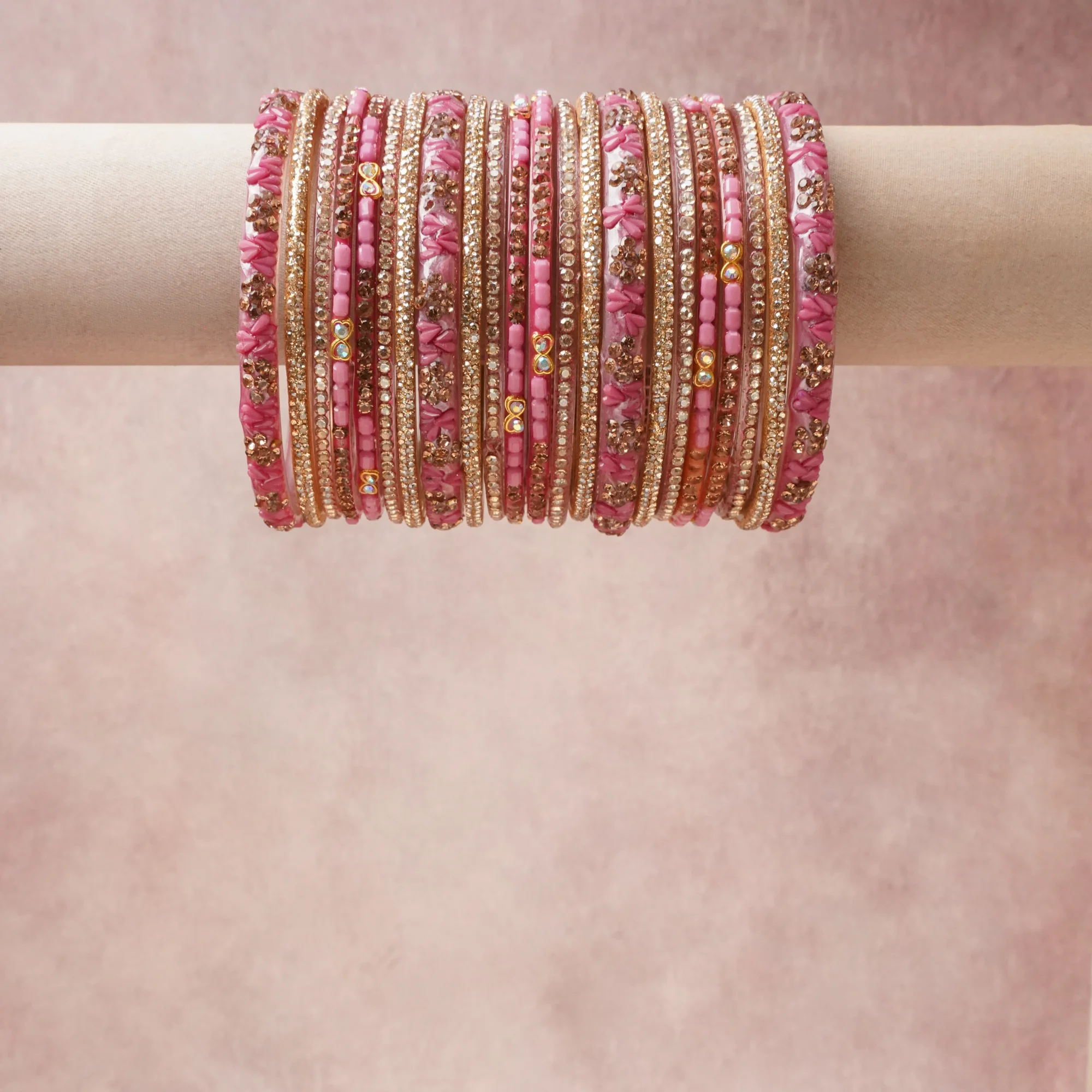 A grounding Fuchsia Pink forms the heart of the set, while touches of Gold, Clear Crystal, Pale Pink add charm.

A thoughtful composition of Resin, Gold-plated Metal, Clear Rhinestones, Glass Beads, designed to feel complete without being heavy.
Each element layers seamlessly, creating a look that is refined, wearable and quietly striking.